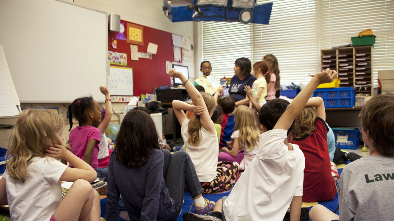 ca-classroom children listening to teacher read
